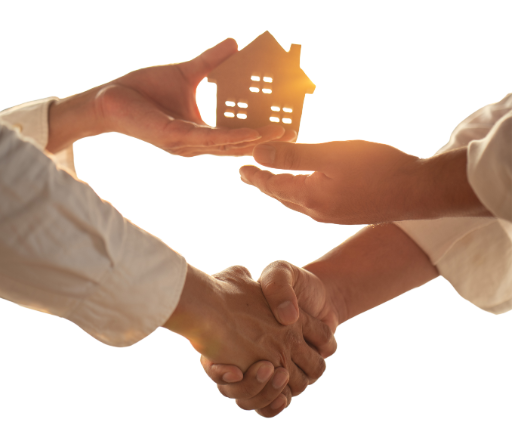 Remise symbolique des clés d'un logement entre un professionnel et un client, illustrant la gestion locative proposée par le réseau Rends-moi un service